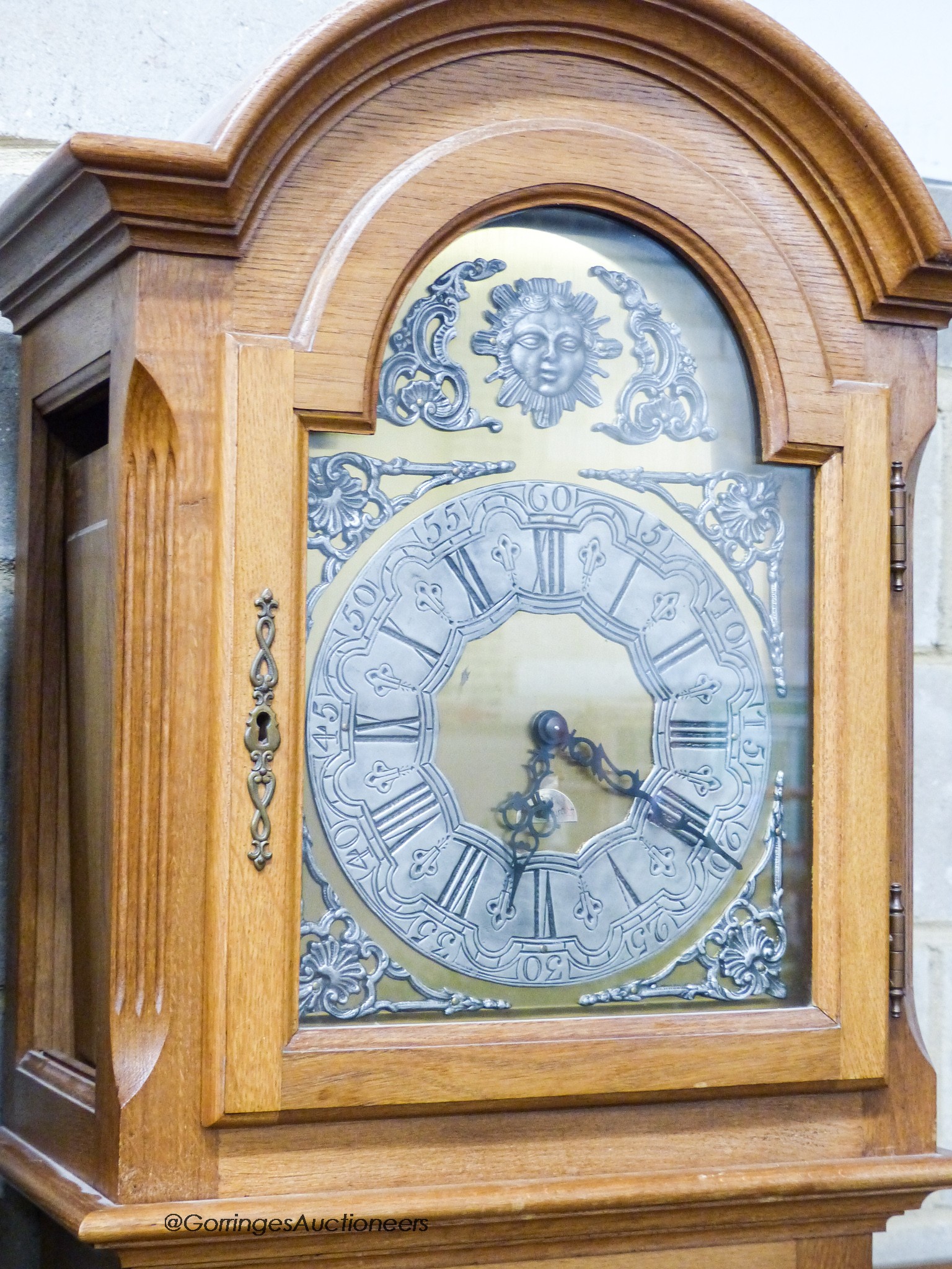 A reproduction oak longcase clock, height 210cm